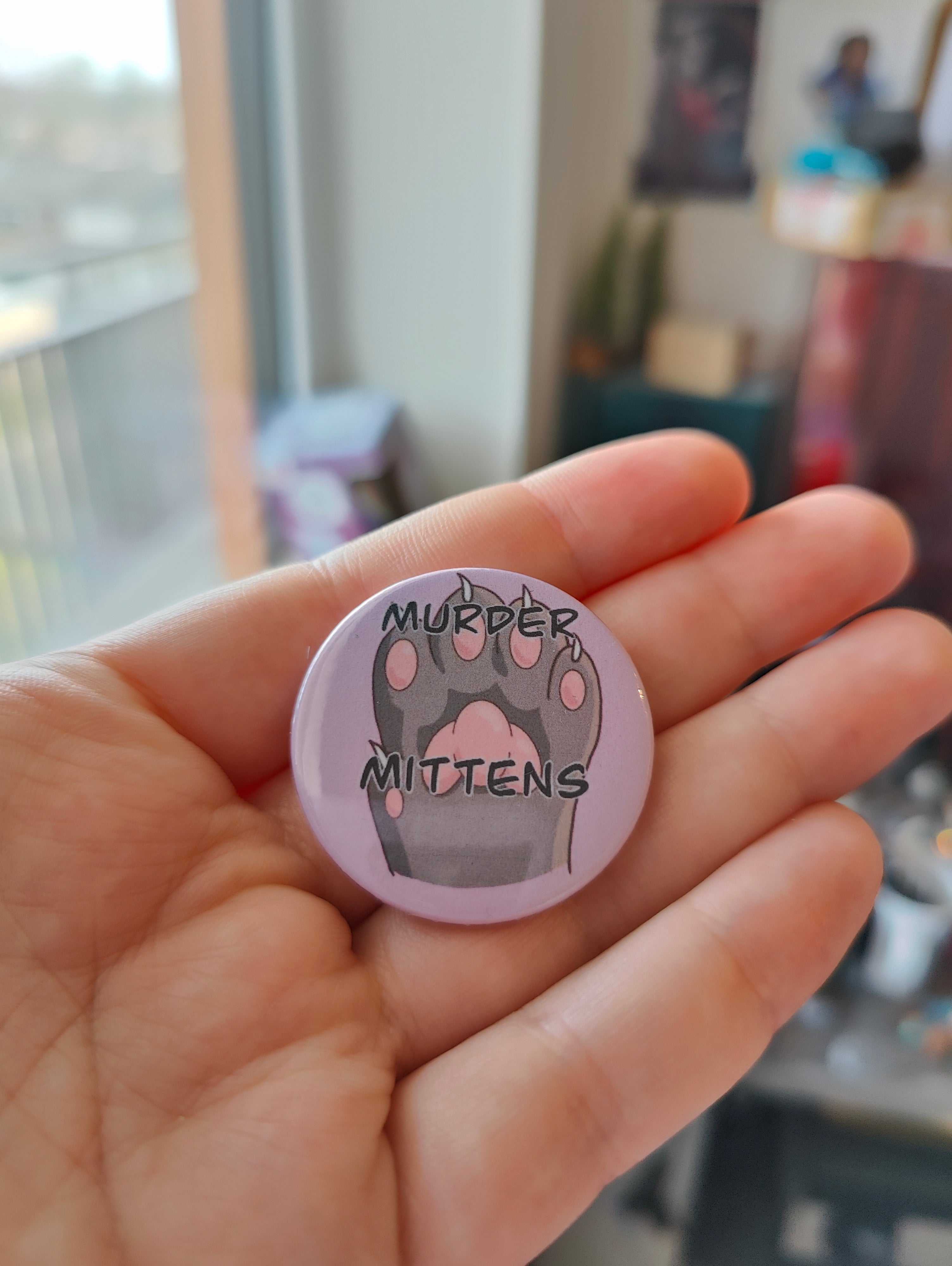 Button: murder mittens