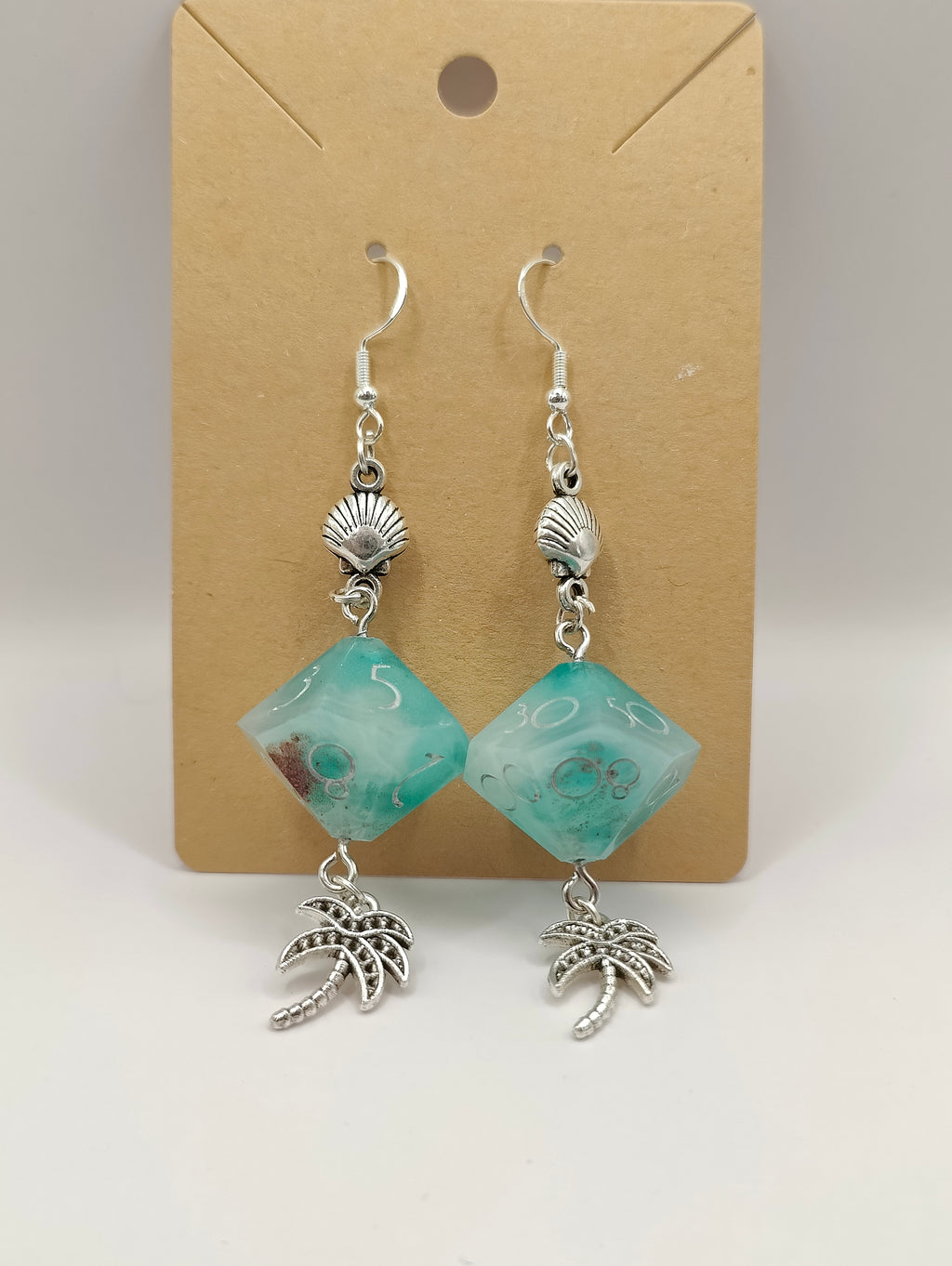 Handmade dangly D10/D% earrings: Seaside view