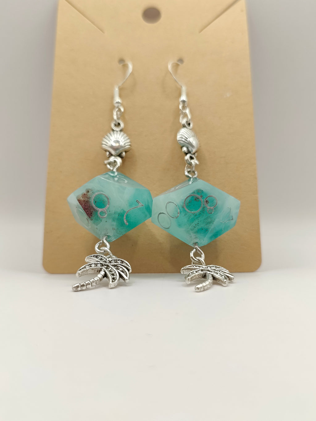 Handmade dangly D10/D% earrings: Seaside view
